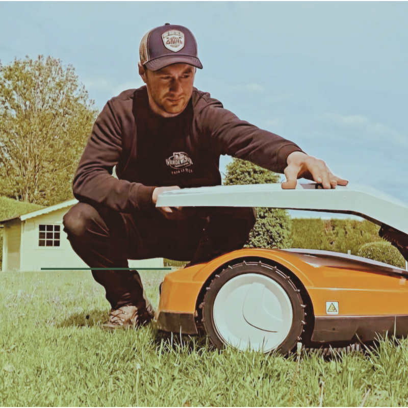 Man operating a lawn mower with text about robot lawn mowing service
